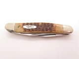 2000 Case XX Muskrat Stainless Steel Jigged Amber Bone Folding Pocket Knife