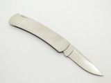 Vintage 1992 Buck 525 USA Raccoon Stainless Handle Folding Lockback Pocket Knife