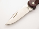 2010 Buck Ranger 112 Ecolite Red Paperstone Handle Folding Hunter Knife