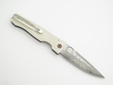 Mcusta Seki Japan Tactility Elite MC-126G Corian SPG2 San Mai Folding Knife