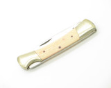 Vintage 80s Explorer 11-393 Imai Seki Japan 3.37" White Micarta Lockback Knife