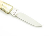 Vintage 80s Explorer 11-393 Imai Seki Japan White 3.37" Micarta Lockback Knife