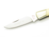 Vintage 1980s Explorer 11-393 Imai Seki Japan White 3.37" Lockback Micarta Knife