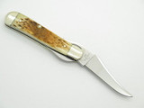 2005 Case XX 61953 Russlock Folding Pocket Knife Amber Jigged Bone
