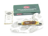 2000 Case XX Muskrat Folding Pocket Knife Jigged Amber Bone