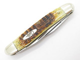 2000 Case XX Muskrat Folding Pocket Knife Jigged Amber Bone