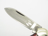 Vtg 1986 Bulldog Brand Tobacco Canoe Folding Pocket Knife Red Glitter