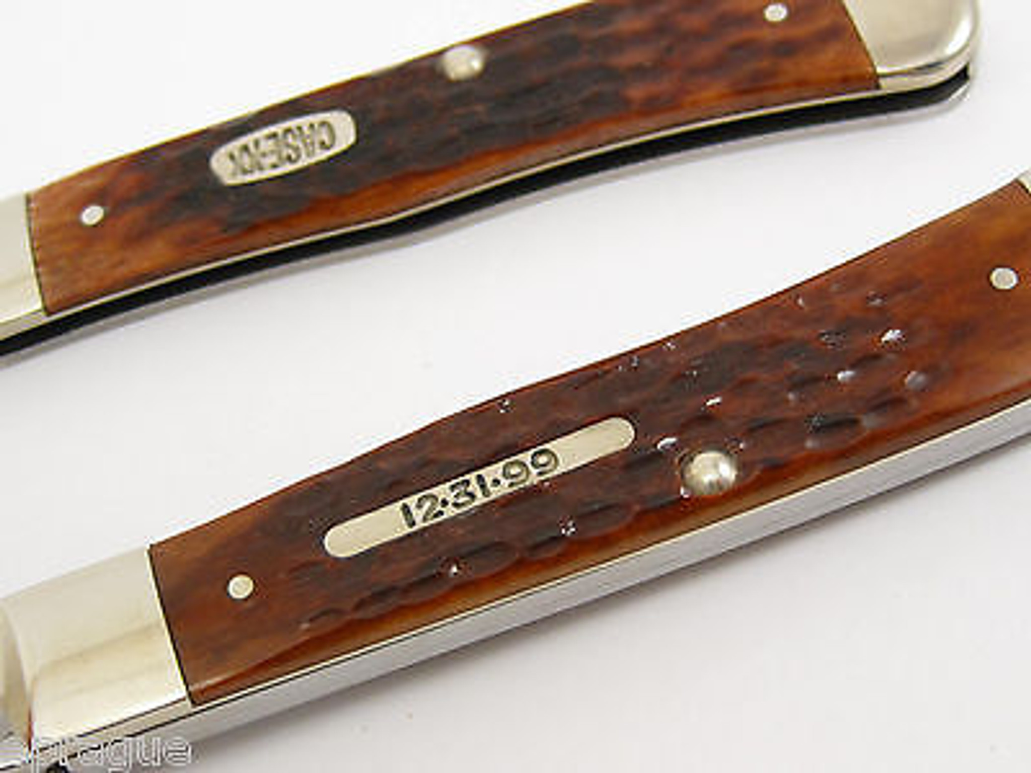 Case XX 6254 # 09845 Brown Bone Hobo Trapper 12-31-99 Shield