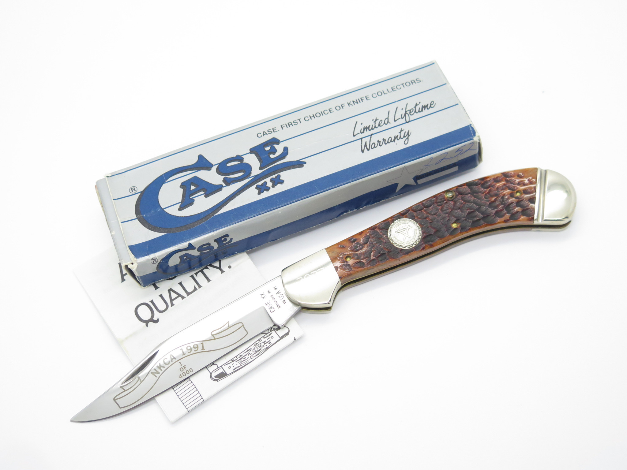 1991 Case XX NKCA 61100 Saddlehorn Jigged Brown Bone Folding
