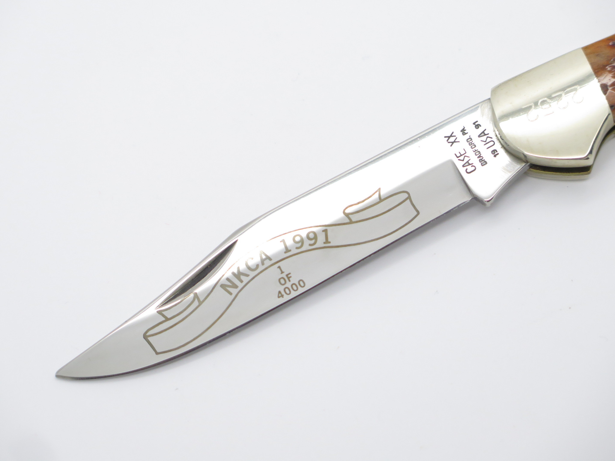 1991 Case XX NKCA 61100 Saddlehorn Jigged Brown Bone Folding