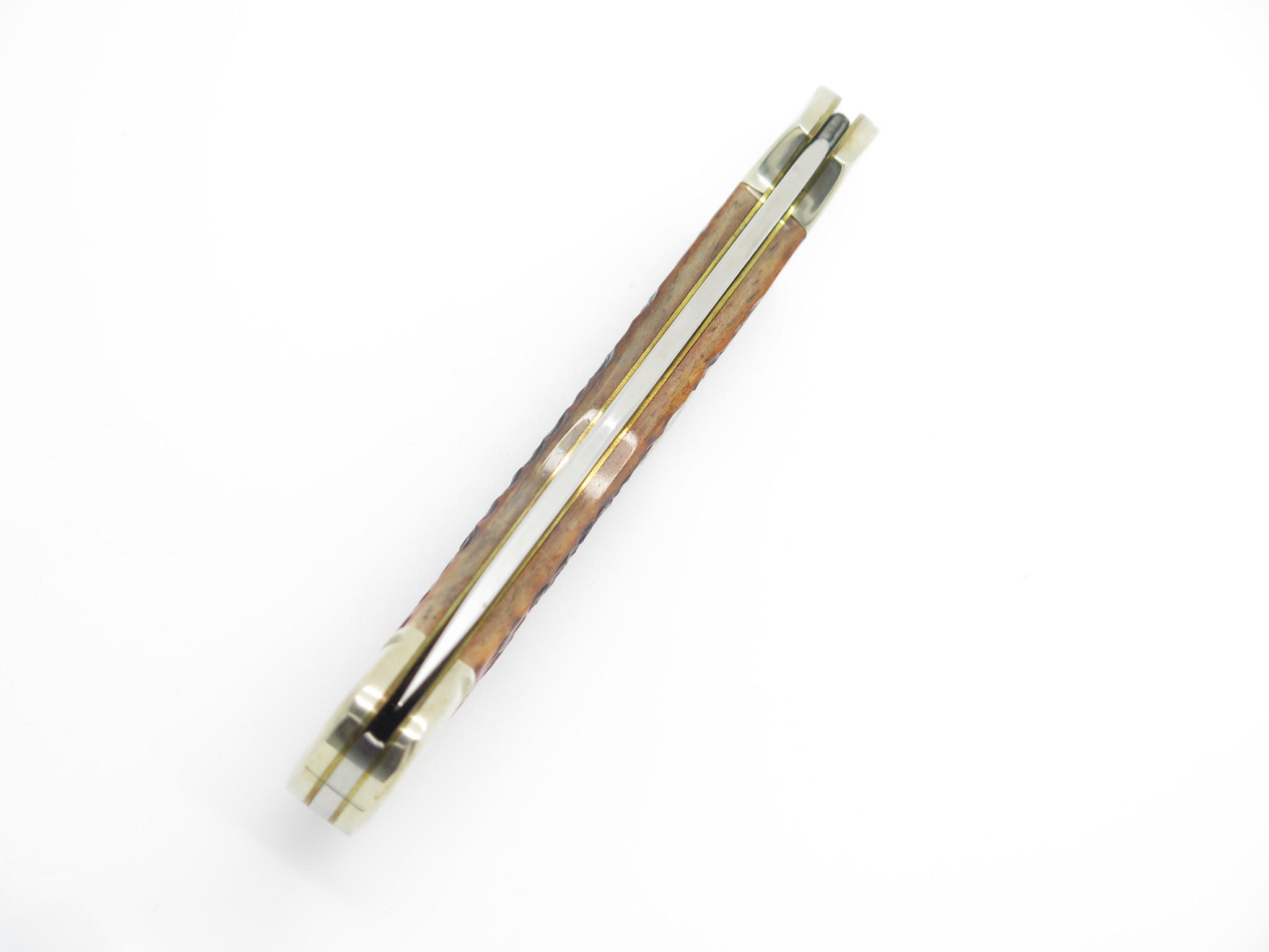 1991 Case XX NKCA 61100 Saddlehorn Jigged Brown Bone Folding