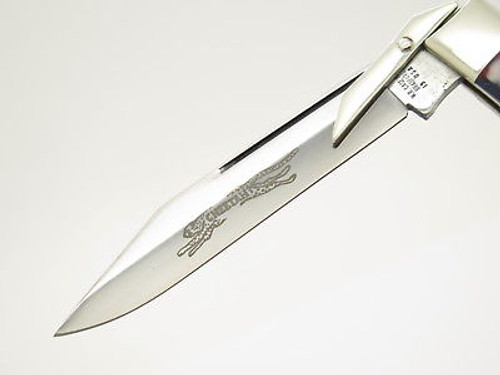 Case Classic XX 61011 1/2 Cheetah Patriot Swirl Swing Guard Folding Knife