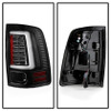Spyder Light Bar LED Tail Lights - All Black for 2013-2014 Dodge Ram