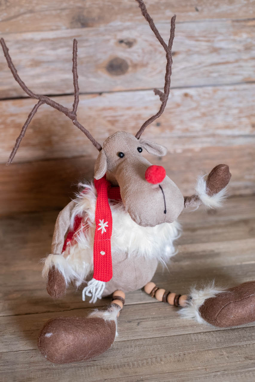 White reindeer plush with black and white stripped scarf and blanket main image 1