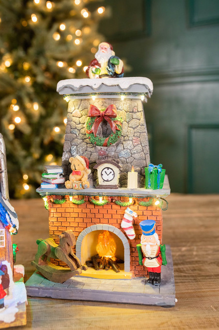 13” H B/O Lighted Musical Santa Coming Out of Chimney
