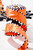 2.5" x 10 Yard Orange Satin with Black & White Piping Ribbon