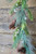 Close Up Of Frosted Pine Cone Garland with Bells