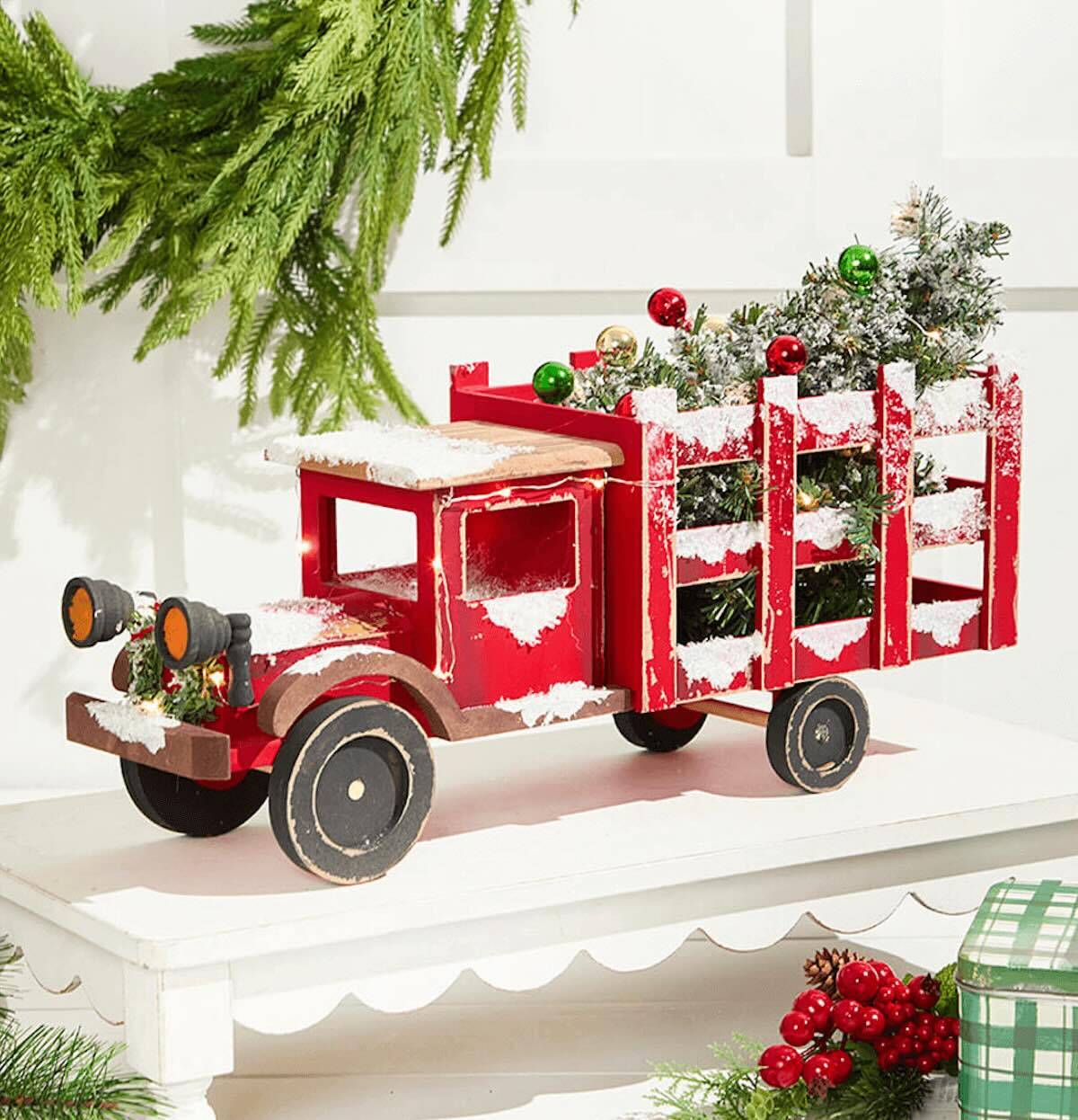 Red truck with tree