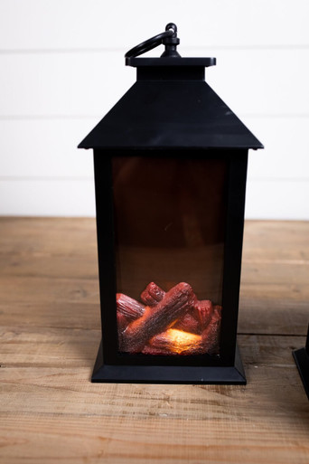 https://cdn11.bigcommerce.com/s-zqoar2tzjl/products/3282/images/13127/fire-log-lantern-2__85416.1623879587.386.513.jpg?c=1