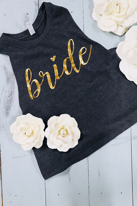 Super soft dark gray bride crop top. Metallic gold wording to match the pep in your step - and to keep the come ons away. Perfectly pairs with comfy pants, date night or a bikini bottom on the honeymoon. XS-2X. Generous fit. 