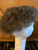Upgrade your style with our Black Afro Topper featuring 40% Grey Human Hair. This top-quality topper measures 7-1/2” front to back and 5” side to side, with a 1” clear poly base and small scallops for a natural look. Don't miss our exclusive clearance sale – grab it now for just a fraction of the regular price Upgrade your style with our Black Afro Topper featuring 40% Grey Human Hair. This top-quality topper measures 7-1/2” front to back and 5” side to side, with a 1” clear poly base and small scallops for a natural look. Don't miss our exclusive clearance sale – grab it now for just a fraction of the regular price