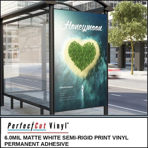 PerfectCut Vinyl 6.0mil matte white semi-rigid print vinyl with permanent adhesive, shown as a vibrant "Honeymoon" travel advertisement poster in a city bus shelter display case.