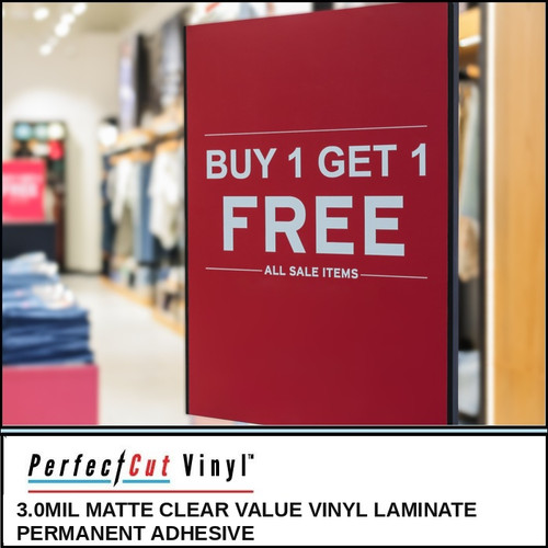 PerfectCut Vinyl 3.0mil matte clear value vinyl laminate with permanent adhesive, shown protecting a red "Buy 1 Get 1 Free – All Sale Items" promotional sign in a retail clothing store.