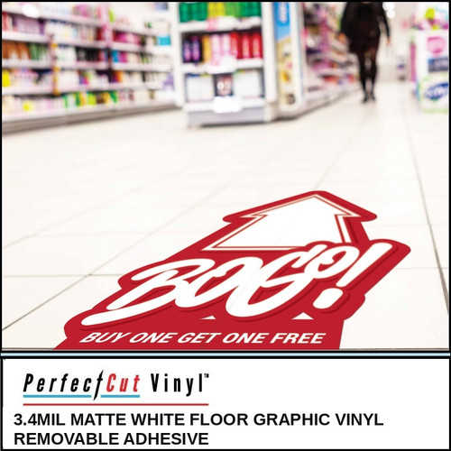 PerfectCut Vinyl 3.4mil matte white floor graphic vinyl with removable adhesive, shown as a red die-cut "BOGO! Buy One Get One Free" promotional floor decal in a retail store aisle.