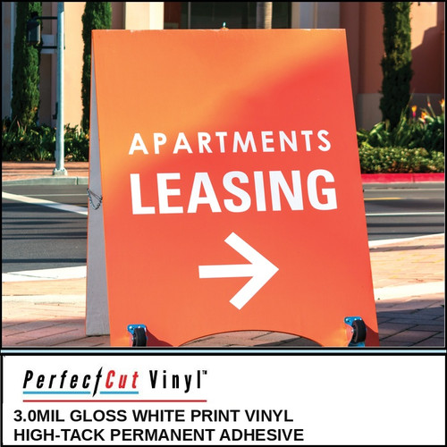 PerfectCut Vinyl 3.0mil gloss white print vinyl with high-tack permanent adhesive, shown as an orange "Apartments Leasing" directional A-frame sidewalk sign with a white arrow.