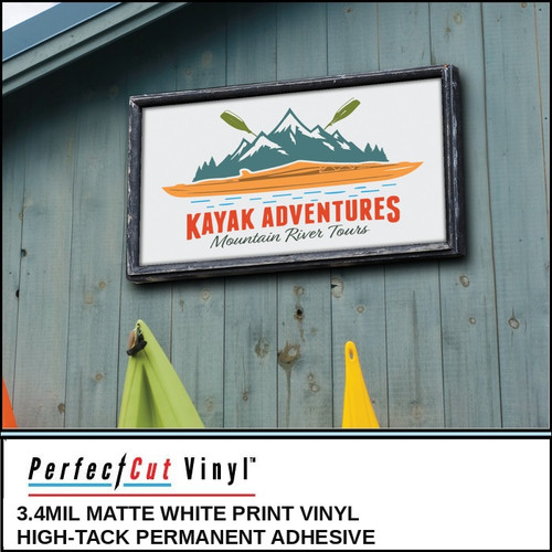 PerfectCut Vinyl 3.4mil matte white print vinyl with high-tack permanent adhesive, shown as a framed "Kayak Adventures Mountain River Tours" sign with a mountain and kayak logo on a wooden wall.