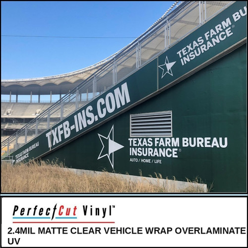 PerfectCut Vinyl 2.4mil matte clear vehicle wrap overlaminate with UV protection, shown protecting a large green stadium structure wrap with white corporate signage under a blue sky.