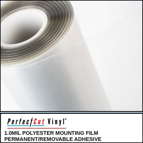PerfectCut Vinyl 1.0mil polyester mounting film with permanent/removable adhesive, shown as a partially unrolled clear film roll on a white surface.