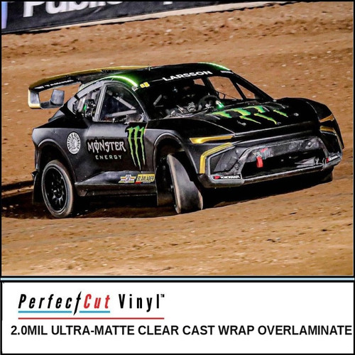PerfectCut Vinyl 2.0mil ultra-matte clear cast wrap overlaminate, shown protecting the finish on a black and green rallycross race car on a dirt track.