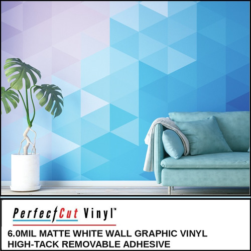 Living room with a geometric blue-and-purple triangle wall mural printed on PerfectCut Vinyl 6.0mil Matte White Wall Graphic Vinyl, beside a teal couch and potted plant