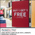 PerfectCut Vinyl 3.0mil matte clear value vinyl laminate with permanent adhesive, shown protecting a red "Buy 1 Get 1 Free – All Sale Items" promotional sign in a retail clothing store.