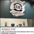 PerfectCut Vinyl 2.4mil gloss white high-performance print vinyl with permanent adhesive, shown as a large "Crossroads CB Plant Based Burgers & Sausages" logo wall graphic on a dark teal interior wall.