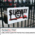 PerfectCut Vinyl 1.0mil satin clear PVF protective overlaminate, shown protecting a "Subway" directional sign with graffiti on it, mounted on a wrought iron fence, demonstrating the film's graffiti-resistant and easy-clean properties.