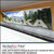 PerfectCut Vinyl 3.5mil matte white opaque block-out cover-up vinyl with high-tack permanent adhesive, shown as a large mountain and forest landscape mural along a subway platform wall.