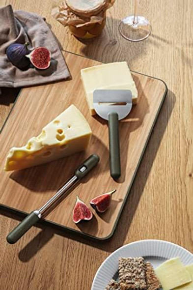 Eva Solo Green tools cheese cutter A cheese cutter with metal wires and the option of cutting in two different slice thicknesses Danish Design & Functionality Kitchen Gadgets & Accessories