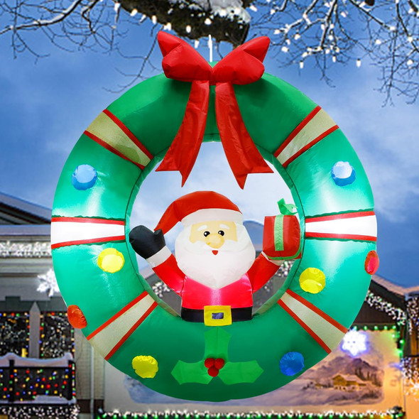 ATDAWN 3ft Christmas Inflatables Blow Up Yard Decorations, Inflatable Santa Claus Sitting on Christmas Wreath Outdoor Decoration, Blow Up Hanging Christmas Wreath for Christmas Yard Garden Decorations