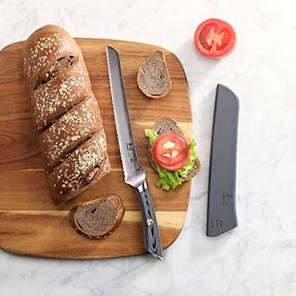 Cangshan Naka Series 503060 X-7 Steel Forged 9-Inch Offset Bread Knife With Sheath Cangshan Naka Series 503060 X-7 Steel Forged 9-Inch Offset Bread Knife With Sheath