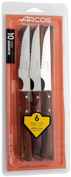 Arcos Steak Knives Set of 6 in Stainless Steel. Meat Knife Pack with Pearl Edge for Cutting and Fillet. Serrated Blade and Beech Wood Handle. Series Mesa