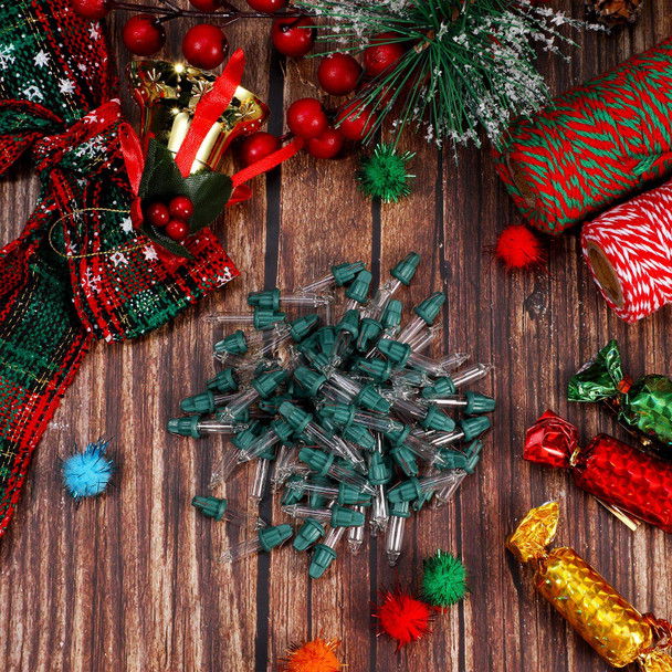 Mudder 100 Pcs Christmas Clear Replacement Mini Light Bulbs Incandescent Light Bulbs 3.5 V Mini Glass Lights with Green Base for Christmas Trees Decor Supplies, 0.125 Ampere, 0.43 Watt(100 Pieces)