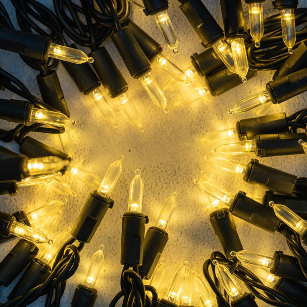 YULETIME Warm White LED Christmas Lights with Black Wire, 66 Feet 200 Count UL Commercial Grade LED Halloween String Light Set (Warm White - Black Wire)