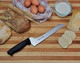 Ergo Chef Prodigy Series 8-Inch Serrated Offset Bread And Deli Knife High Carbon Stainless Steel Bread Slicer Ergonomic Comfort-Grip Handle (Black) Ergo Chef Prodigy Series 8-Inch Serrated Offset Bread And Deli Knife High Carbon Stainless Steel Bread Slicer Ergonomic Comfort-Grip Handle (Black)
