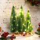 10 Pcs Artificial Mini Christmas Trees 5 Size Bottle Brush Pine Trees Christmas Village Decorations with Santa Snowmen Ornament and LED Light String for DIY Craft Tabletop Desk Display