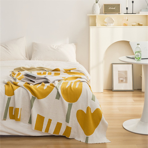 Soft Throw Blanket - Home Decor
This soft throw blanket is perfect for keeping warm on a chilly day. The beautiful tulip design in off-white with yellow and red tulips will brighten up any room, and the cotton blend fabric is incredibly soft to the touch. Add a touch of elegance to your home with this decorative blanket.