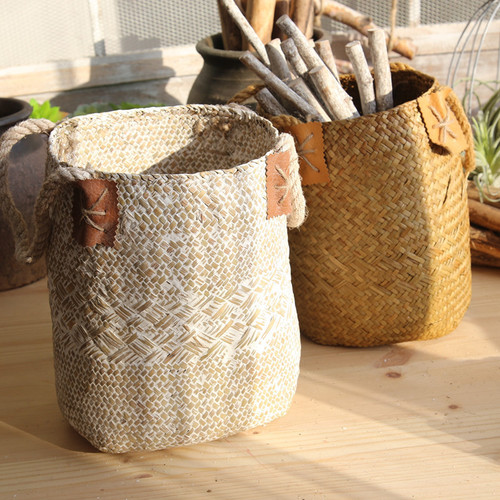 Hand Woven Basket | Decorative Straw Storage Baskets 
Get a hand-crafted piece for your home with this beautiful straw decorative basket. A perfect choice for flowers, laundry, or storage - the seagrass material makes it both practical and unique. Available in small and large sizes from Ruby and Lola Home Decor.