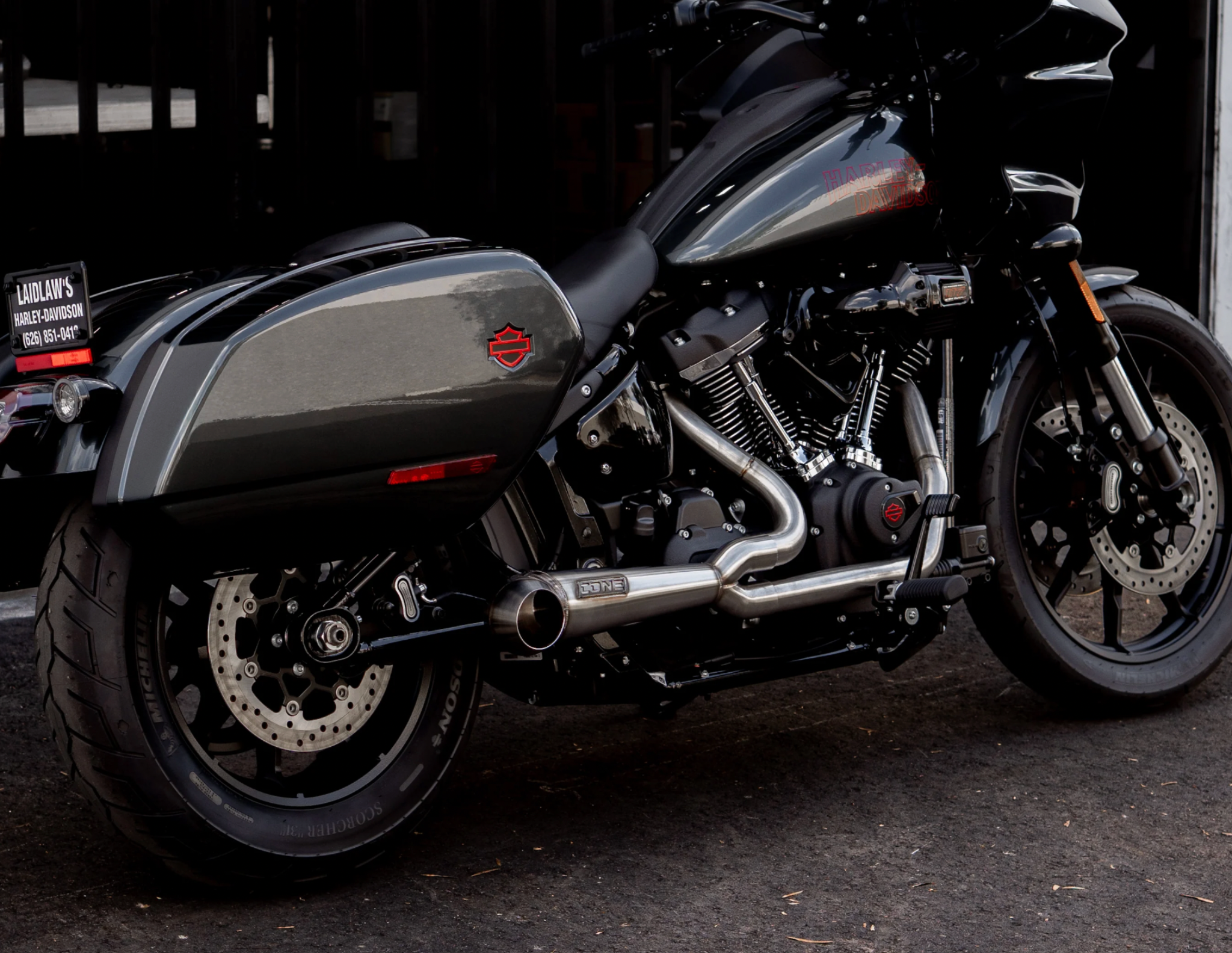 Harley Davidson bagger with Cone Performance exhaust three quarter view