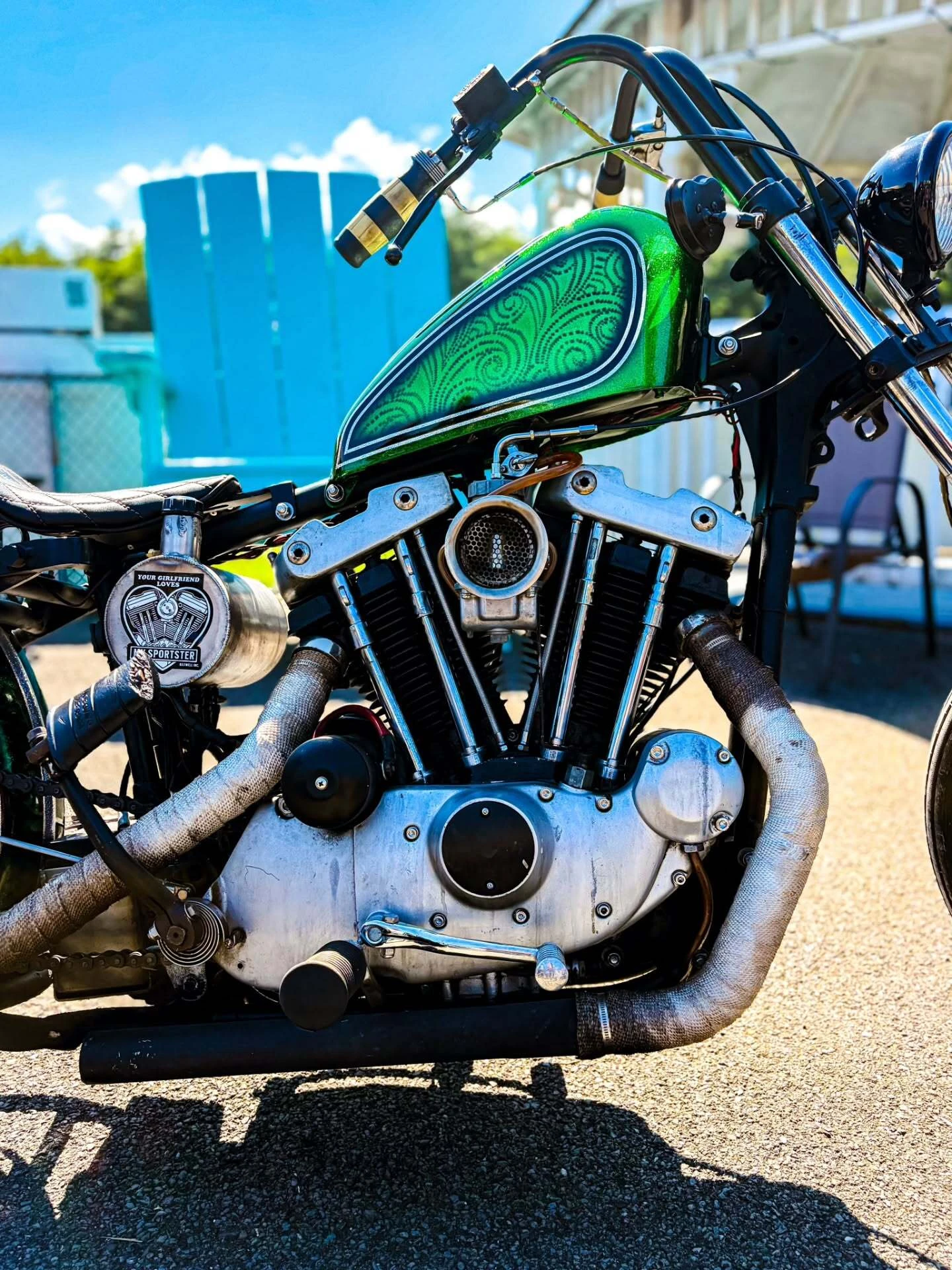 Green tank chopper with big chrome pipes at DBR 2026
